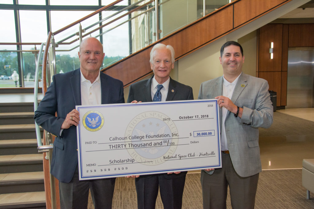 Joe Burke (center), interim president at Calhoun Community College, with Terry Abel (left) and Dan Merenda of the National Space Club Scholarship Education Committee.