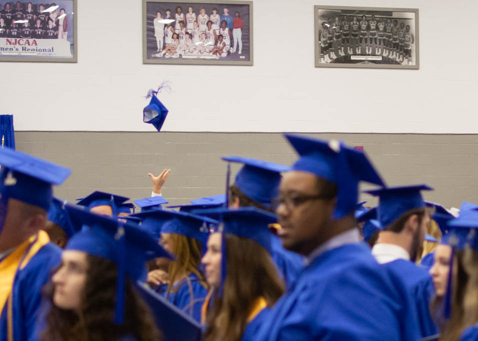 graduation cap thrown in the air